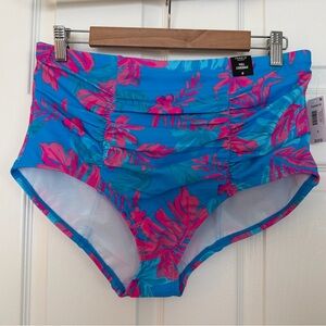 TORRID HIGH RISE RUCHED SWIM BOTTOM
TROPICAL GEO BLUE SEA